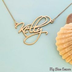 Order any name for your solid 14K gold Kelly Artistic style nameplate necklace!! A great personalized custom made gift for any occasion!! Birthday, Graduation or Any Holiday! *Both the nameplate and chain are all solid 14k gold. *Stamped for authenticity 14K (Hallmarked 14k) *Nameplate is 0.9 mm high quality thickness. *Font is larger than my other fonts, the capital will be approximately 1.3 cm tall *This listing is for one (1) name with one (1) capital letter only! Maximum is 9 letters. 10 or Elegant 14k Gold Custom Name Necklace, Custom Name Necklace For Anniversary Gift, Personalized Gold Necklace For Anniversary, Personalized Gold Necklace For Anniversary Gift, Gold Custom Name Necklace For Anniversary, Custom Name Gold Necklace For Anniversary, Customized 14k Rose Gold Name Necklace, Personalized Yellow Gold Name Necklace For Anniversary, Classic Gold Name Necklace For Personalized Gift