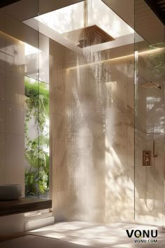 A luxurious marble bathroom featuring a rain shower illuminated by natural light, with high-end fixtures, glass walls, and greenery visible through large windows, creating a serene spa-like atmosphere. Rainshower Bathroom Ideas, Large Luxury Bathroom, High End Bathroom Design Luxury, Shower Rain Head, Palermo House, Rustic Showers, Modern Spa Bathroom, Rain Shower Bathroom, White Marble Shower