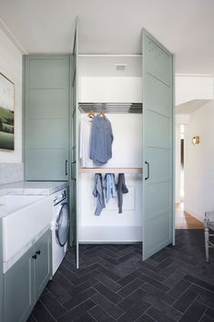 a washer and dryer in a small room