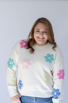 Are you ready to brighten everyone's day with our Flower Power Daisy Print Sweater!? This white knit sweater has the most adorable pastel daisy print that is perfect to help you transition from Winter to Spring. This sweater is perfectly light weight and detailed with a ribbed contrast hem around the round neckline and arm cuffs. Pair it with jeans on a chilly day, or with shorts for the perfect Spring look! - White knit sweater with pastel daisy print - Light weight knit sweater - Ribbed contra Cute Crew Neck Sweater For Spring, White Soft Knit Sweater For Spring, Trendy Cream Sweater For Spring, Cream Crew Neck Sweater For Spring, Playful White Sweater For Spring, Playful White Knit Sweater, White Floral Print Sweater For Spring, White Crew Neck Sweater For Spring, Arm Cuffs