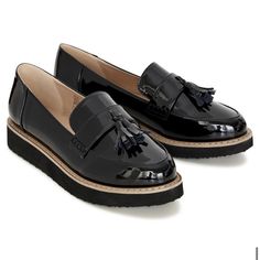 Step Into Style With Our Jane Flat Shoe. Complete With Fun Tassel Detailing, You'll Love The Cushioned Wide Fit And Round Toe For Ultimate Comfort. Key Features Include: - Wide Fit - Round Toe - Tassel Detail - Cushioned Insole - Patent Faux Leather Fabrication - Slip On Style - Thick Flatform Sole Keep Styling Simple With Tucked In Leggings And A Flowing Tunic. 100% Man-Made Materials Casual Black Slip-on Tassel Loafers, Black Slip-on Tassel Loafers With Round Toe, Black Casual Slip-on Tassel Loafers, Casual Black Slip-ons With Brogue Detailing, Trendy Black Slip-ons For Formal Occasions, Black Slip-on Tassel Loafers With Closed Toe, Black Tassel Loafers Slip-on Closed Toe, Casual Black Tassel Loafers With Round Toe, Black Patent Leather Platform Loafers Flat