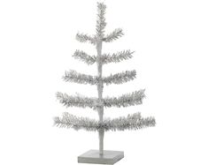 a white christmas tree on a stand with silver needles and snow flakes in the shape of a pine