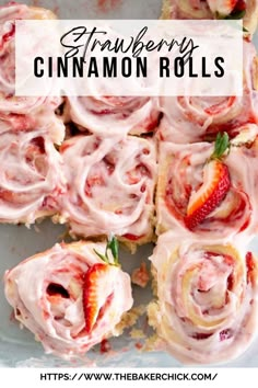 strawberry cinnamon rolls with icing and strawberries in the middle on a white plate