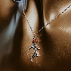 Handmade Cassian inspired necklace with red rhinestone  Choose necklace length 18in or 22in  Lobster clasp Nickel free Silver Cassian Acotar, Bat Boys, Bat Wing, Inspired Necklace, Wing Necklace, Pretty Necklaces, Red Rhinestone, Star Necklace, Bat Wings