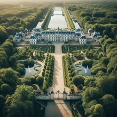 an aerial view of a large palace surrounded by trees