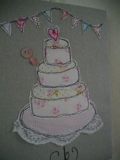 a handmade card with a wedding cake on it