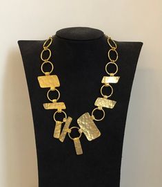 Vintage Dolce Vita 1970 - 1980 necklace / hammered golden metal / good condition despite some wear on the gold to clean / dimension in the photo / unique and original necklace / sewing / ideal for a gift or for a super modern look https://antiquairesdesmodes.com Collier vintage Dolce Vita 1970 - 1980 / métal doré martelé / bon état malgré quelques usures sur l'or à nettoyer / dimension sur la photo / collier unique et original / couture / idéal pour un cadeau ou pour un look hyper moderne Gold Necklace 16 Inch For Party, Gold Metal Necklaces For Party, Gold-tone Plated Metal Chain Necklace, Gold-tone Brass Necklace With Large Pendant, Costume Jewelry Plated Necklaces For Jewelry Making, Unique Gold-tone Brass Necklaces, Unique Gold-tone Brass Necklace, Bronze Metal Necklace For Party, Gold Long Metal Necklace