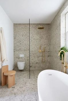 a stylish terrazzo bathroom Bathroom Terrazzo, Terrazzo Decor, Oval Tub, Kensington House, Mews House, Wooden Stool