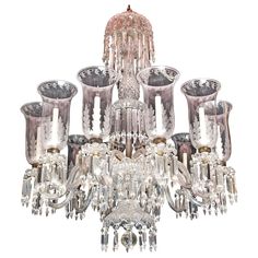 a chandelier with many glass pieces hanging from it