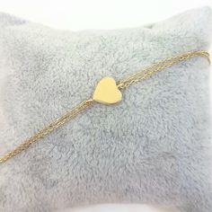 -The heart bracelet is made with high quality 14K real solid gold. The size of the heart is 8mm X 8mm. There is double chain. - This tiny, dainty, charm, delicate and trendy bracelet has been artfully designed for timeless yet modern millennial fashion. - You receive the bracelet in a beautiful and free gift box. - The bracelet length is 7 inches. We can shorten it. just write on personelized ares. - Free shipping (Arrive within 4 business days to USA and Canada ( 1 day for production + 3 days f 14k Yellow Gold Bracelets For Friendship, Elegant Heart-shaped Chain Bracelet, Adjustable 14k Yellow Gold Heart Bracelet, Valentine's Day Gift Tarnish Resistant Chain Bracelet, Yellow Gold Bracelets As Valentine's Day Gift For Her, Gold Name Bracelet With Heart Charm For Anniversary, Yellow Gold Bracelets, Valentine's Day Gift For Her, Yellow Gold Heart Chain Bracelet For Anniversary, Yellow Gold Heart Bracelet For Anniversary On Mother's Day