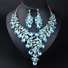 Whether you are the bride to be, or a bridesmaids, or the mother of the bride, this Bridal Jewelry is
perfect for just about anyone! Blue Jewelry Sets For Wedding, Wedding Crystal Jewelry Sets With Matching Earrings, Wedding Crystal Jewelry Sets With Earrings, African Wedding Jewelry, Cheap Bracelets, Crystal Statement Necklace, Bridal Accessories Jewelry, Crystal Clutch, Alloy Earrings