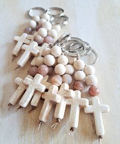 Beautiful handmade and high quality cross keychain favors 2 10mm matte fossil jasper accepted with 1 10mm faceted pink sunstone gemstone beads  Stainless steel key ring and 20x30mm cross Available in other stones Beige Spiritual Jewelry Gift, Rosary Favors, Keychain Crafts, Keychain Favors, Mini Rosaries, Worship Night, Ceramic Crosses, Cross Keychain, Keychain Craft