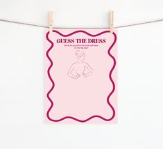 a poster hanging on a clothes line that says guess the dress