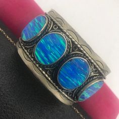 Vintage Blue Cuff Bracelet, Blue Oval Vintage Cuff Bracelet, Vintage Blue Cuff Jewelry, Blue Collectible Cuff Bracelet Bangle, Blue Round Cuff Bracelet For Formal Occasions, Unique Blue Cuff Bracelets, Blue Cuff Bracelets, Bohemian Blue Cuff Bracelet, Blue Adjustable Unique Cuff Bracelet