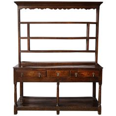 an old wooden desk with drawers and shelves