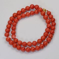 Thank you for coming in! Classic 18K solid gold necklace with Mediterranean Sardinia Coral sphere bead, no dye, 100% natural tomato red color. 49.8 grams~Our favorite color for coral! Manufactured in Italy, AAA quality! You'll get the necklace you see! SIZE of coral: Appr. 8.3mm-9mm Weight: 49.8 grams MATERIAL: 18k Solid gold, Natural coral Formal Single Strand Red Coral Necklace, Elegant Red Coral Jewelry With 8mm Beads, Elegant Orange Jewelry With 8mm Beads, Elegant Round Coral Necklace, Elegant Coral Round Necklace, Classic Round Coral Jewelry, Coral Round Beaded Necklace Gift, Yellow Gold Necklaces With 8mm Round Beads, Classic Coral Round Jewelry