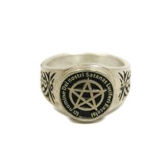 This ring was designed with the Satan's Invocation symbol. The beautiful pewter ring is a silver color and the background is blackened to bring out the fine detail of the design. Our rings are 100% Lead and nickel free pewter and made in the USA The top design part of the ring measures about 15 mm in diameter The ring band tapers from about 15mm to about 4.5mm at the bottom and is about 1.75mm thick Rings are available in sizes 7 to 14 Silver Rings With Antique Finish, Silver Antique Finish Rings, Antique Finish Silver Metal Rings, Gothic Silver Engraved Ring, Silver Gothic Engraved Rings, Symbolic Silver Skull Ring, Silver Symbolic Skull Ring, Symbolic Silver Ring With Antique Finish, Symbolic Antique Silver Ring With Oxidized Finish