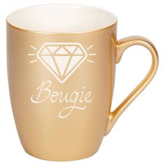 a gold coffee mug with the words bougie written on it and a diamond