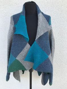 Knitted wool cardigan, coat, sweater in a combination of several colours - grey, green, several shades of blue. It's as if it's made up of different square-shaped pieces. You can wear it unbuttoned, you can use a belt or a button. A unique and exclusive handmade garment. Material: wool. Size: fits all sizes, oversized. Also check out the measurements below: Shoulder Approx: 53 cm - 20.87 inches Full Length: 86cm - 33.86" Sleeve length from shoulder 53-57 cm - 20.87-22.44" CONDITION: In very good Wrap Cardigan, Kimono Cardigan, Womens Cardigan, Wool Cardigan, Wool Sweaters, Cardigans For Women, Knit Cardigan, Sweaters & Cardigans, Sweater Outfits