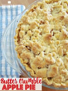 a close up of a pie in a pan on a table with the words butter crumble apple pie