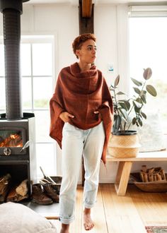 The Henna Poncho represents the slow, Tasmanian shack life in Australia. Wear it on morning strolls, days spent exploring, and communal dinners on cool nights by the fire. Layer the poncho effortlessly to bring comfort and warmth to each day. It invokes feelings of true serenity, peace, and stepping away from all distractions. Hand woven in Nepal on majestic wooden looms using a soft, unique yarn and finished with perfectly twisted tassels. Life In Australia, Native American Clothing, Womens Poncho, Unique Yarn, Peruvian Connection, Coastal Town, American Clothing, Fall Favorites, Individual Style