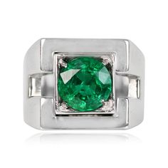 A vintage French emerald ring featuring a 2.01 carat round cut natural emerald, set in prongs inside a square bezel. The mounting is 18k white gold, with geometric cut-outs on the shoulders. This ring was handcrafted during the Retro era, circa 1940, and bears French hallmarks.
The measurements of the emerald are approximately 8.45mm x 8.50mm x 5.11mm. The measurements of this ring are approximately 14.37mm x 14.45mm.
This ring can be resized at no extra cost.
If you have any questions about the Timeless Polished Emerald Ring, Formal White Gold Emerald Signet Ring, Classic Green Signet Ring With Center Stone, Timeless Emerald Signet Ring For Formal Occasions, Classic Formal Tsavorite Diamond Ring, Classic White Gold Tsavorite Ring, Classic Tsavorite Emerald Ring With Prong Setting, Art Deco Round Cut Emerald Ring, Green Prong Set Signet Ring For Formal Occasions