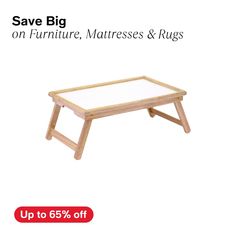 a small wooden table with white top and legs on sale for $ 6 95 off