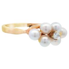 This stunning 14k yellow gold ring is made by the world renowned Tiffany & Co. and features pearl with a diamond centerstone. This unique combination of materials is the perfect blend of natural wonders and elegance. Fun and durable enough to be worn on a daily basis, out and about, while still being sophisticated enough to wear to any formal event. Tiffany & Co. 14k Yellow Gold Diamond and Pearl Ring  Ring size: 4.5 14k yellow gold 1 = .02 carat, round cut, VS2 clarity, F/G color diamond 6 = Ak Diamond And Pearl Ring, Pearl And Diamond Ring, Tiffany And Co, Akoya Pearls, Yellow Gold Ring, Ring Ring, Jewelry Rings Engagement, Pearl Ring, Natural Wonders