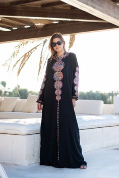 This stunning kaftan with its monotone embroidery will be your summer favorite. It is an extremely comfortable wear, light and soft and can be used on many occasions -  home gatherings, festival parties, summer occasions, dinners, or just in your home to feel comfortable.  Fabric : 70% Egyptian Cotton and 30% Polyester Sizes : The dress comes in two sizes. S/M/L which fits up to a size 14 US (Large) and one that fits up to a size 22 US (2XL). It comes with a cinch in the back to accentuate your beautiful body.   Kaftan measurements in inches : S/M/L Bust : 44-45 Hip : 50-51  X/2XL Bust : 49-50 Hip : 55-56 Length : 57 inches For reference, the model is 5'6" (170cm) and a size 6 US (small) and is wearing a large . The kaftan comes with a cinch in the back which is used to tighten across the Embroidered Caftan, Cotton Caftan, Belle Silhouette, Colorful Embroidery, Summer Favorites, Caftan Dress, Egyptian Cotton, Look Plus, Dress Clothes For Women