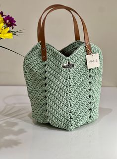 VANE Handmade Handbag Camila Crochet bag made of polyester yarn in the color bright olive - Elegant leather handles for a modern touch - Elastic model - Dust bag, perfect for safe storage Dimensions: 25 x 32 cm Bags Crochet, Handmade Handbag, Handmade Handbags, Safe Storage, Crochet Handmade, Handmade Bag, Polyester Yarn, Leather Handles, Handmade Bags