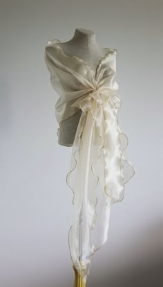 Mother of the bride shawl. Evening cover up. Organza shawl. Shoulder cover up. Evening wrap. Stole. Elegant design evening wrap made with holder flower style. You can look dress up on this shawl even with simple dress. Champagne organza shawl. Shawl has adjustable flower holder which easy to adjust on shoulders as needs.  Fabric - sheer  organza.  {{ SIZE : whole length 90" ,width 20"}} {{ CARE: warm water hand wash , hang up to dry, low temperature iron! }} COLORS: keep in mind that colors of i Organza Shawl, Detail Couture, Evening Shawls, Bridal Cover Up, Gaun Fashion, Flower Fashion, Fancy Dresses, Shawls And Wraps, Costume Design