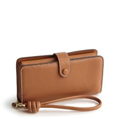 Phone Wristlet Chic Wristlet With Removable Pouch, Chic Rectangular Wristlet For Daily Use, Classic Wristlet With Removable Pouch For Travel, Classic Travel Wristlet With Removable Pouch, Modern Travel Wristlet Clutch, Chic Travel Wristlet With Wrist Strap, Elegant Travel Wallet With Wrist Strap, Chic Rectangular Leather Wristlet, Elegant Brown Wristlet For Everyday Use