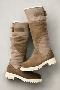 Command cold-weather style with rustic warmth and femininity in the Tabitha tall boots. These beauties offer protection from the elements with their waterproof Italian leather and suede construction, and keep you steady on your feet with treaded TPR outsoles. Inside, your feet and lower legs will be embraced by plush shearling lining with a wool cuff, lending natural warmth, insulation, and breathability. Finishing off this handsome wear-everywhere design are buckles at the calf and inner zippers for easy on/off. Rugged Shearling Boots For Outdoor, Rugged Outdoor Shearling Boots, Rugged Winter Waterproof Boots With Suede Lining, Rugged Waterproof Boots With Suede Lining For Winter, Winter Tall Boots, Waterproof Suede Boots, Leather Boots For Women, Women's Winter Boots, Ankle Cowboy Boots