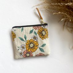 Stash your odds and ends with this adorable square mini zipped pouch! As beautiful as it is functional, these bags are perfect for travel or everyday use! A mini first aid kit, a manicure set, jewelry holder or small makeup bag - it can be used for any organizational purpose!  Buy it for yourself or as a thoughtful gift to a friend or a family member! Makes a great gift paired with a gift card holder.  Specs: Approx 5"x4" Metall ykk zipper  Zipper is accented with a leather pull tag Lined with a Cute Yellow Bag For Personal Use, Cream Rectangular Coin Purse For Everyday Use, Rectangular Cream Coin Purse For Gift, Cream Pouch Wallet As Gift, Cream Rectangular Cosmetic Bag Gift, Yellow Zipper Pouch Coin Purse For Daily Use, Yellow Rectangular Cosmetic Bag With Zipper, Cream Zipper Pouch As Gift, Cream Rectangular Coin Purse