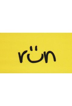 the word run written in black ink on a yellow background with an emoticive smiley face