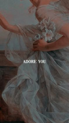 an image of a woman in a dress with the words adore you