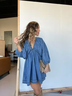 Denim Dress With Jacket, Farm Theme Outfit Women, Short Flowy Dress Outfit, Satin Dress Cowboy Boots, Denim Dress With Tights, Denim Dress And Boots, Nashville Dress Outfit, County Concert Outfit Summer, Jean Jacket With Dress