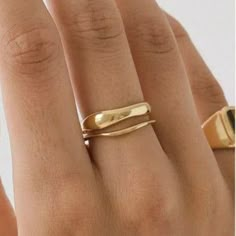 Two bands, cast from hand-sculpted wax models in the “Squiggle” silhouette, are perfectly made to stack with each-other or worn separately.  Crafted to be enjoyed and admired, these two-tone rings will bring an artful and unique touch to any outfit. High polished to a high gloss in this bold, elegant ring. Wear it all day in anticipation of an evening out; it will not go unnoticed. Materials: Silver: Stainless Steel. Gold: 18K Gold Vermeil Stainless Steel 100% Eco-Friendly; No Nickel, Chromium and Lead  Water-resistant, sweat-proof, hypoallergenic and tarnish-free. You can work out in our durable jewelry, wear it to the beach, pool or even shower with it. Affordable Hypoallergenic Yellow Gold Jewelry, Gold Bands For Women Simple, Gold Jewelry Minimalistic, Womens Elegant Rings, 18k Gold Rings For Women, Cheap Open Band Jewelry For Everyday, Gold Rings Two Fingers, Casual Jewelry Gold, Good Thumb Ring