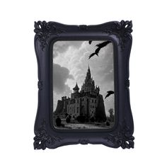 a black and white photo of a castle with bats flying in the sky above it