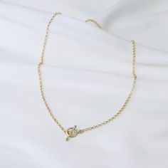 "14K Gold Toggle and Rolo chain necklace *The chain, toggle clasp and all components are 14K yellow gold (If you order a 16\" necklace, it will be a toggle clasp plus chain will be 16\".) The toggle clasp is about 12mm. 2.3mm Rolo chain Please read our policies before you place your order. https://www.etsy.com/shop/SashJewelry/policy?ref=shopinfo_policies_leftnav To see other Mother daughter necklace set click here: https://www.etsy.com/shop/SashJewelry?section_id=12441134&ref=shopsection_le Yellow Gold Toggle Necklace With Adjustable Chain, Minimalist Yellow Gold Toggle Necklace For Everyday, Gold Minimalist Toggle Necklace With Cable Chain, Everyday Gold Toggle Necklace With Cable Chain, Minimalist Yellow Gold Toggle Necklace With Adjustable Chain, Gold Link Toggle Necklace With Delicate Chain, Gold Minimalist Toggle Necklace With Adjustable Chain, Dainty Gold Toggle Necklace With Delicate Chain, Elegant Everyday Toggle Necklace With Cable Chain