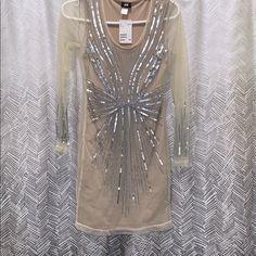 Sheer With Slip Party Sequin Dress Beige Mini Dress For Summer Party, Beige Summer Party Dress, Summer Party Beige Mini Dress, Glamorous Beige Mini Dress With Sequins, Spring Embellished Sequin Dress Party-ready, Spring Party-ready Embellished Sequin Dress, Beige Sequin Mini Dress For Evening, Party-ready Sequin Dress For Date Night In Spring, Fitted Champagne Mini Dress For Holiday Party