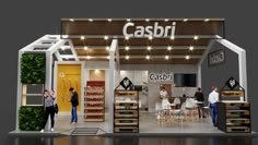 an exhibition stand with people standing in front of it and the words casbri on the wall