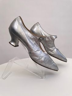 "These 1920s shoes are made from very soft silver coloured leather and they are lined in leather. They are not sized, so please go by the measurements given here to assess the size. The length is approximately 10\" inches from the tip of the toe to the back of the heel so they are quite long, the heel height is 2\" inches and the width is narrow, being 2.75\" inches across at the widest point across the sole. Please also bear in mind that the toes are quite pointed. The condition is very good overall, with minor signs of age to the surface of the leather and the inside of the shoes. Please see all the photos and zoom in for details." 1920s Womens Shoes, A Gentleman In Moscow, Edwardian Shoes, 1920s Shoes, Historical Shoes, Wonderful Wizard Of Oz, Shoes And Socks, Womens Mary Janes, Mary Jane Shoes Womens