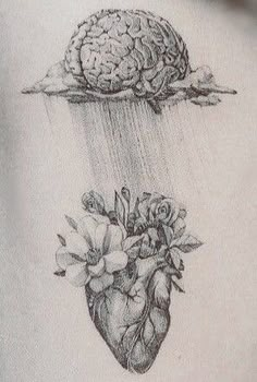 a drawing of a heart with flowers and an brain on it's back side