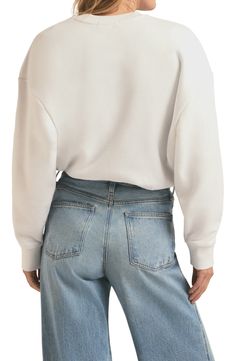 Here's the slightly slouchy sweatshirt that's the favorite to win at weekends. 27" length (size Medium) Crewneck Long sleeves 75% cotton, 25% polyester Machine wash, tumble dry Imported Casual Cropped Crew Sweater With Ribbed Cuffs, Casual Relaxed Fit Cropped Crew Sweater, Relaxed Fit Cotton Cropped Sweater With Drop Shoulders, Relaxed Fit Cropped Sweater With Drop Shoulder For Loungewear, Relaxed Crew Neck Sweatshirt For Spring, Comfy Relaxed Fit Sweatshirt With Ribbed Waistband, Oversized Sweats With Ribbed Waistband For Everyday, Relaxed Fit Cotton Cropped Sweater For Athleisure, Relaxed Fit Cotton Cropped Sweater In Athleisure Style