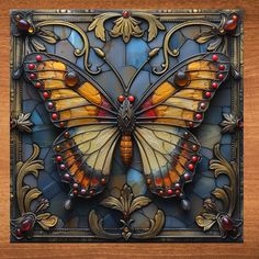 a stained glass butterfly with red berries on it's wings, sitting on a wooden surface