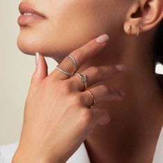 In a world of overcomplicated jewelry pieces, the Two-Tone Diamond Pavé Fan Cuff Ring offers an air of effortless sophistication. High-end recycled gold is twisted artfully by Ecksand's masterful craftspeople and accented by a brilliant diamond pavé to create an irresistible, eye-catching piece. Accent diamonds: 0.20+ ctw, VS2+/F+ Setting: Castle setting Printable Ring Size Chart, Cuff Ring, Types Of Diamonds, Cuff Rings, Recycled Gold, Brilliant Diamond, Conflict Free Diamonds, Pave Diamonds, Jewelry Pieces