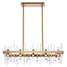 a large brass chandelier with clear glass tubes hanging from it's center