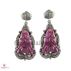 1.85 CTS Pave Diamond Earring 925 Silver Jewelry Genuine Diamond Earring Ruby Carving Earring Gemstone Jewelry Vintage Look Jewelry Earring Details: Item Code : GJ-ER084 Diamond Weight : 1.85 Cts Ruby Weight : 35.85 CTS Gross Weight : 11.77 Grams Earring Size : 40*17 MM NOTE:- All The Products Are Designed And Manufactured In My Workshop By Me & My Team. Shown Products Are Purely Handmade . Custom Orders Are Open Handly Accepted. We Are Perfect Choice For Any Custom Jewelry Manufacturing. Fo Silver Diamond Earrings With Gemstones, Silver Diamond Gemstone Earrings, Elegant Sterling Silver Earrings With Stone Setting, Fine Jewelry Round Stone Setting Earrings, Fine Jewelry Earrings With Round Stone Setting, Fine Jewelry Earrings With Stone Setting For Formal Occasions, Fine Jewelry Formal Earrings With Stone Setting, Sterling Silver Earrings With Stone Setting For Formal Occasions, Fine Jewelry Earrings With Stone Setting