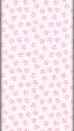 a white and pink wallpaper with paw prints on it's side, in the shape of circles